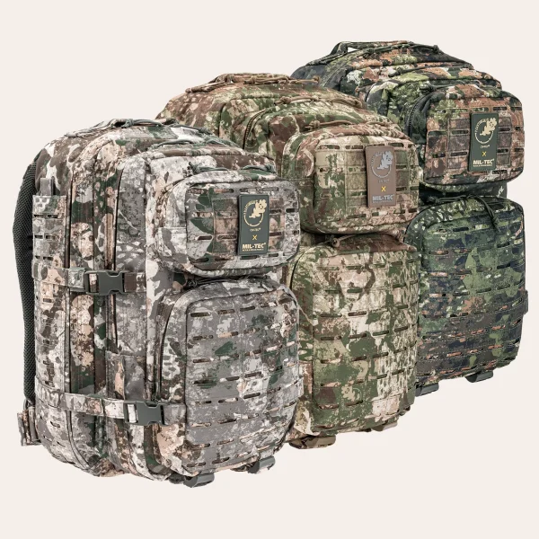 Todas as três versões da mochila A MIL-TEC US Assault Pack LG Laser Cut dos padrões de camuflagem WASP I Z1B, Z2, e Z3A da Phantomleaf Todas as três versões da mochila A MIL-TEC US Assault Pack LG Laser Cut dos padrões de camuflagem WASP I Z1B, Z2, e Z3A da Phantomleaf