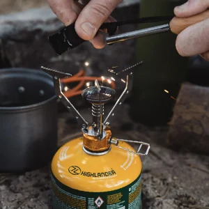 O fogão a gás dobrável Highlander Outdoor HPX100 Compact Stove