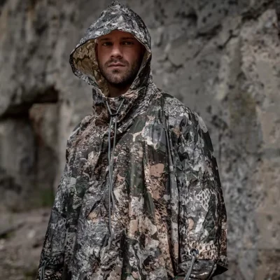 Poncho MIL-TEC Ripstop impermeável em padrões PhantomLeaf WASP I Z1B, WASP I Z2 e WASP I Z3A para uso outdoor, trekking e bushcraft.